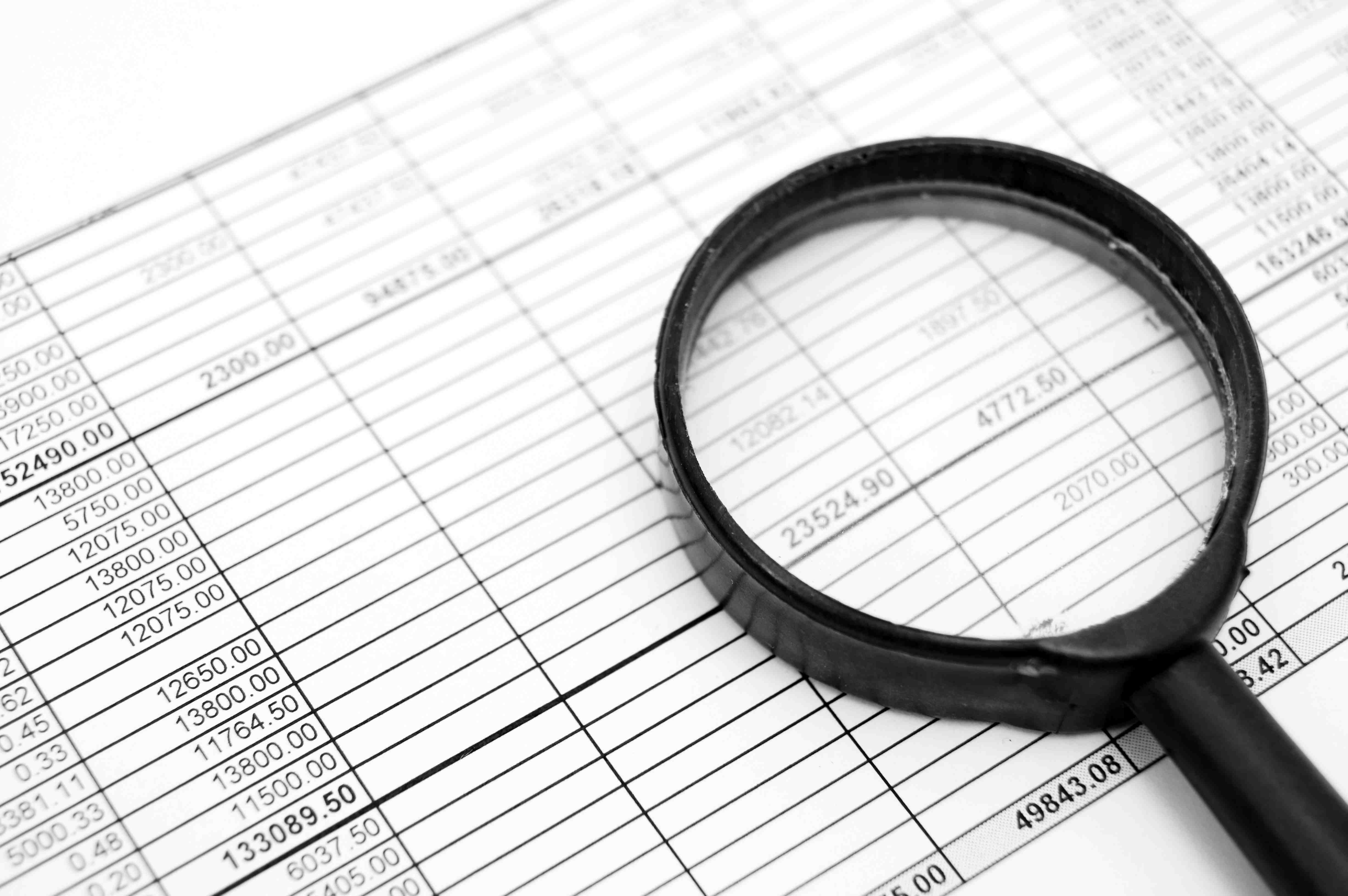magnifiers-and-documents-accounts-department-2026-01-05-23-21-44-utc